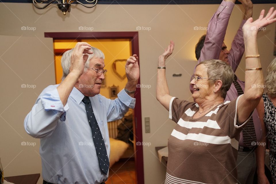 Dancing elderly couple 