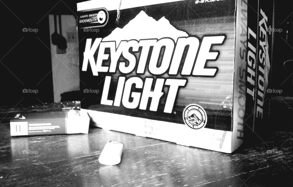 Keystone Light. Table of Keystone Light Beer and Newport Cigarettes.
