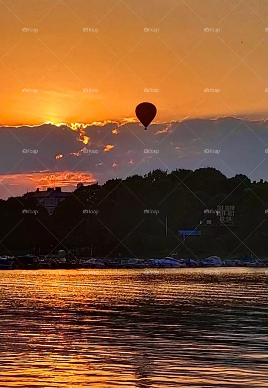 Hot air balloon over the sea at sunset, Helsinki - Finland