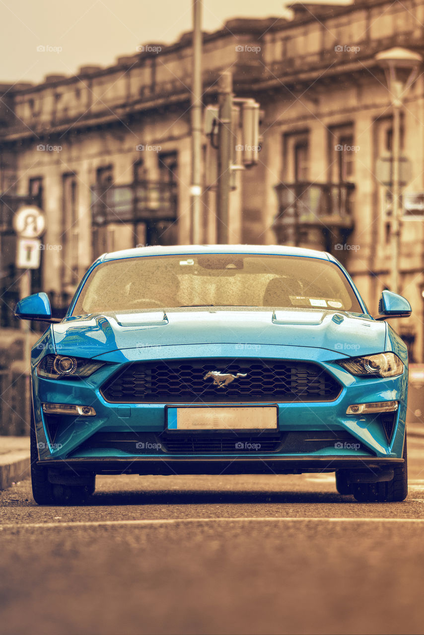 Beautiful blue Mustang car parked in the streets of Galway city centre in Ireland