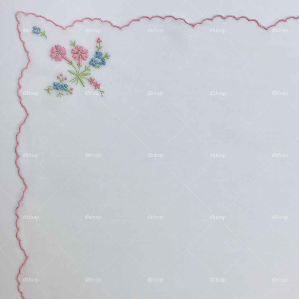 Decorative background border of embroidered solid white plain empty blank fabric