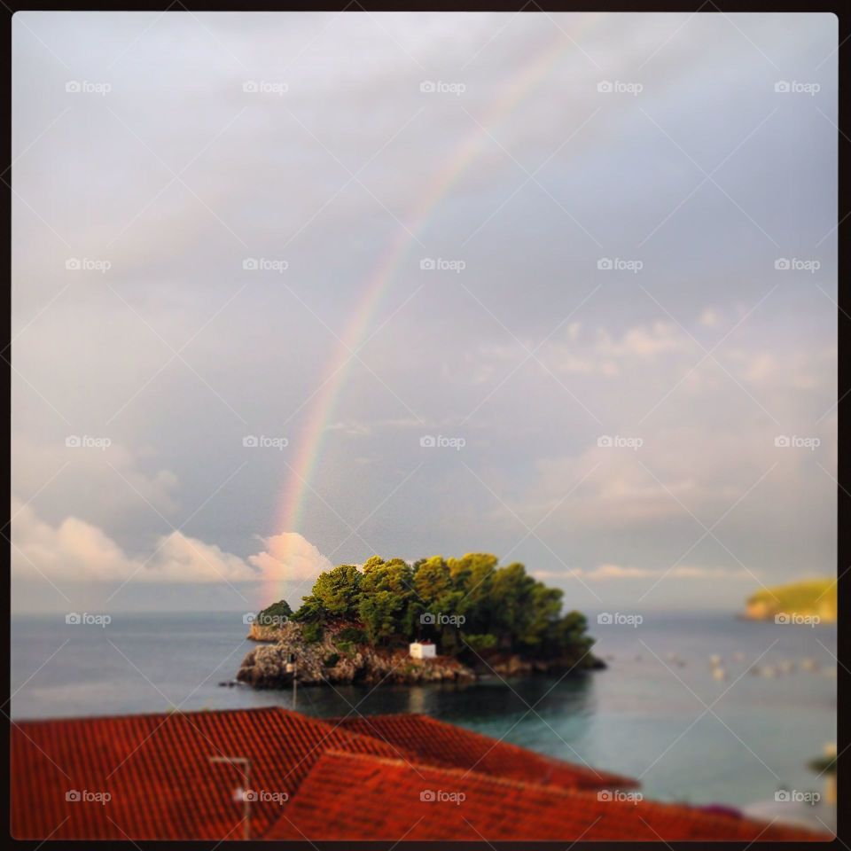 Panagia island with rainbow, Parga, Greece