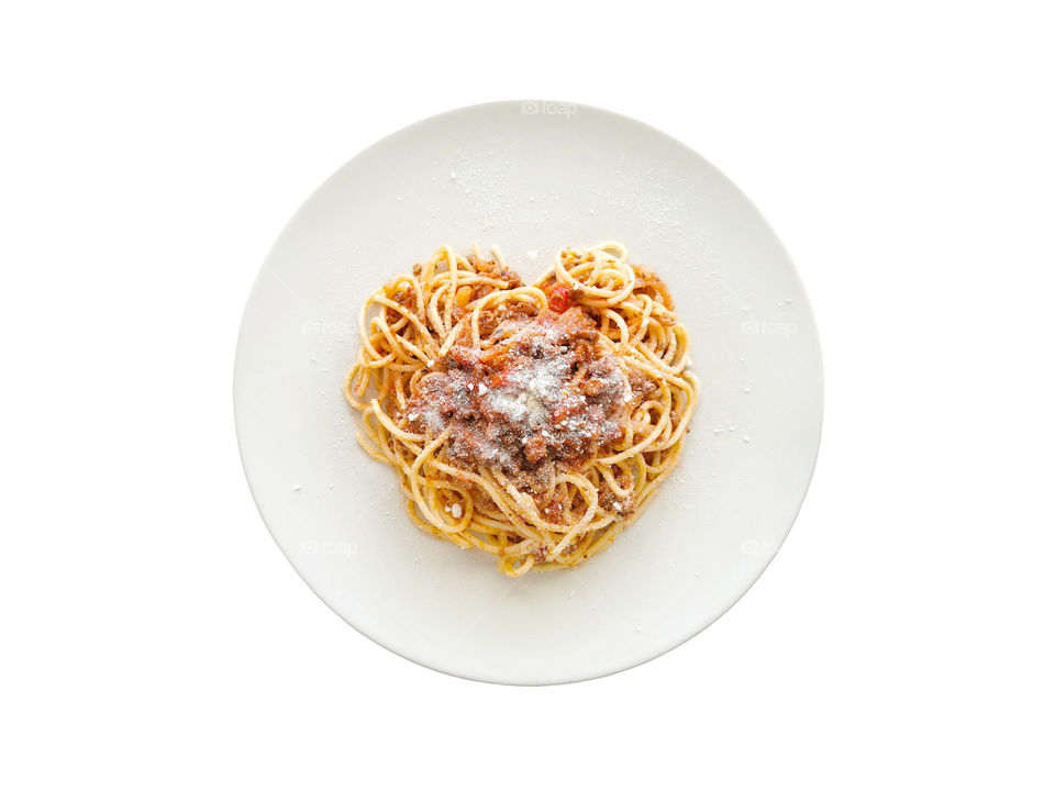 Spaghetti bolognese in heart shape.