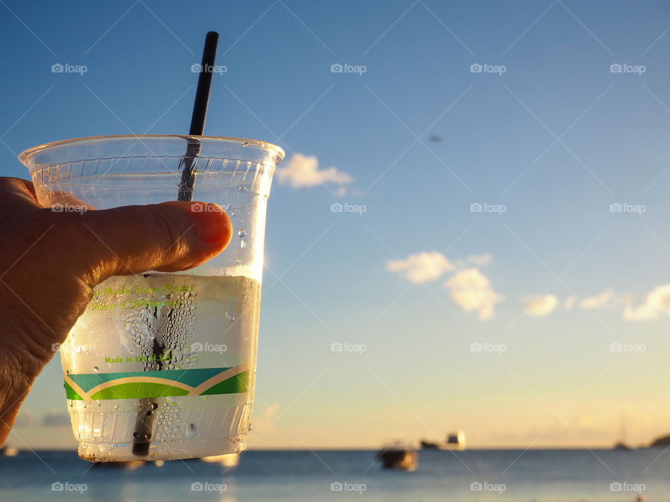 Cold drink on the beach. 