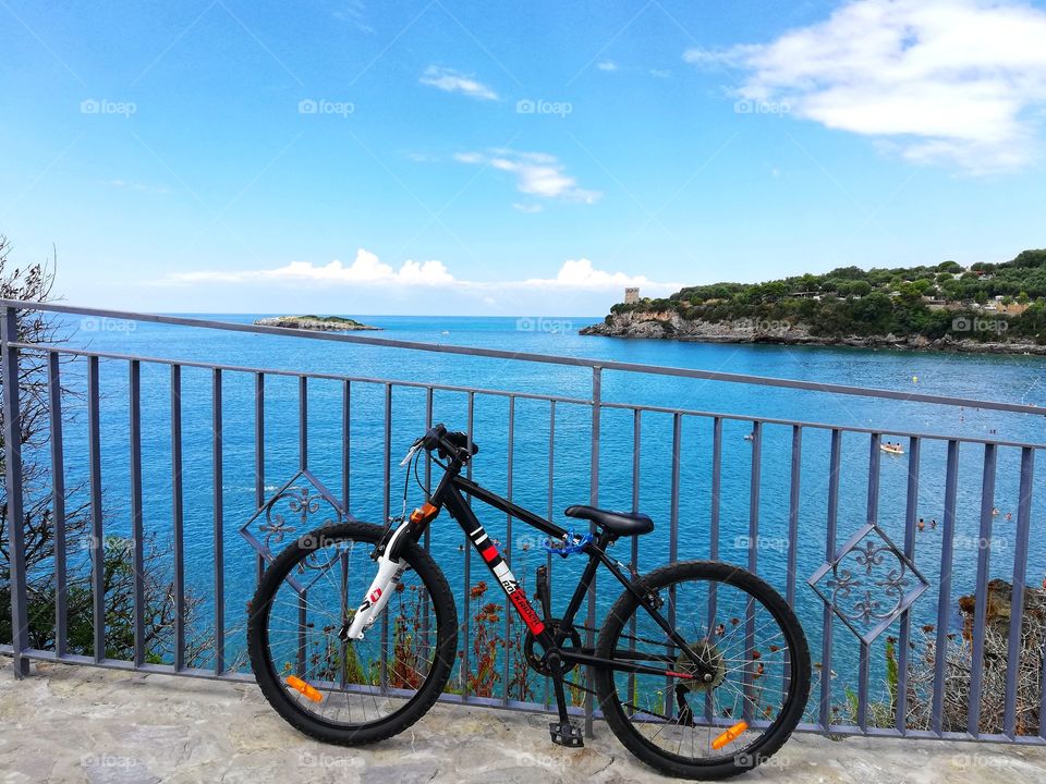 rock rider bike parked in an Italian seaside resort
