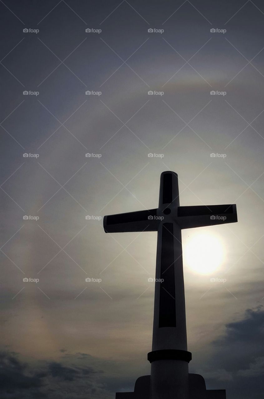 Radiance: This cross is the only visible part of the so called "Sunken Cemetery" in the Islands of Camiguin, Philippines