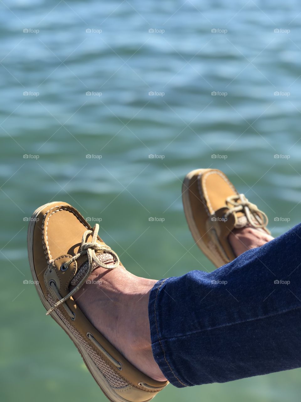 Sitting on the dock by the bay