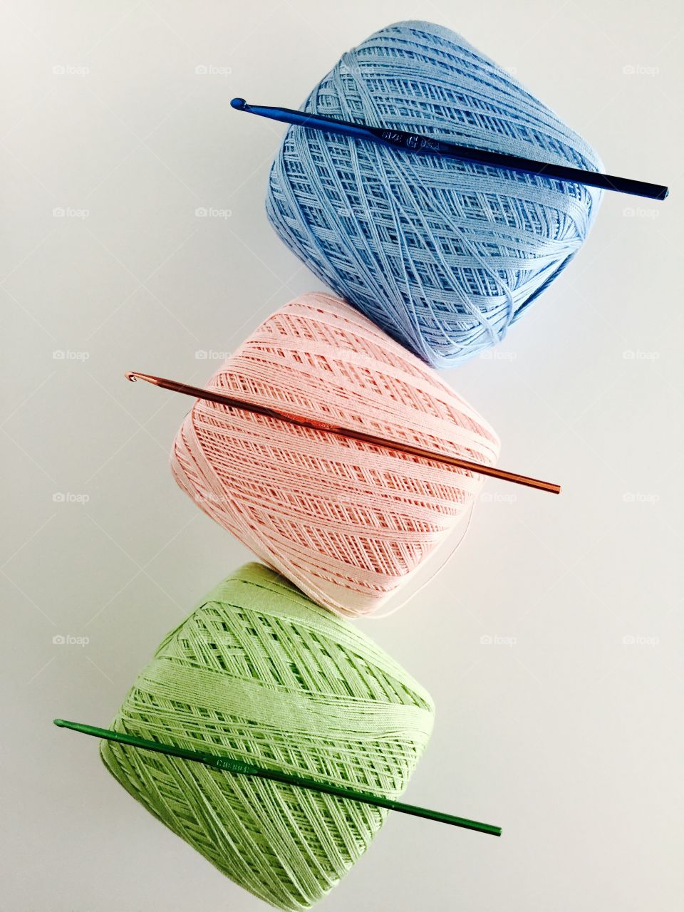 Ball of yarn with knitting needle
