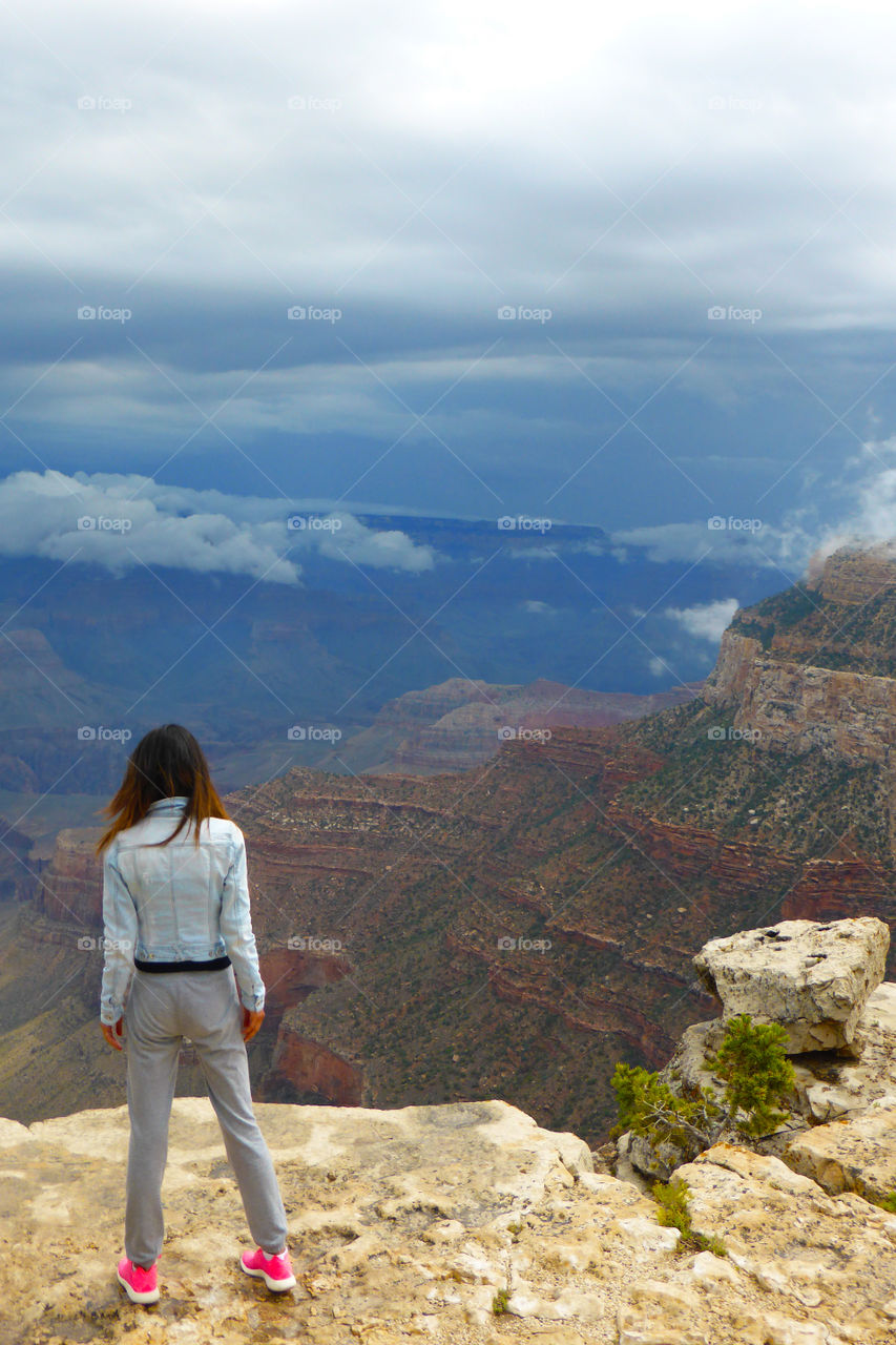 Woman is Looking down at Grand Canyon national park