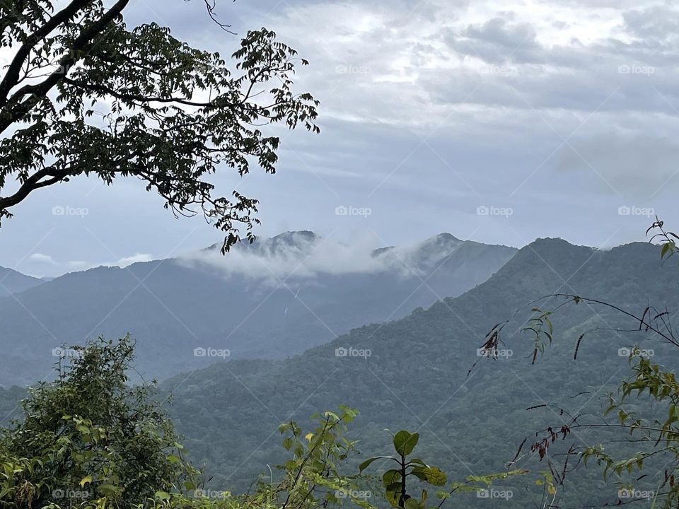 Clouds are sleeping at the tip of mountain 