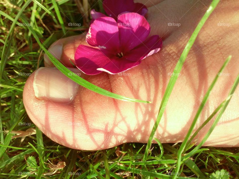 Big toe with a flower