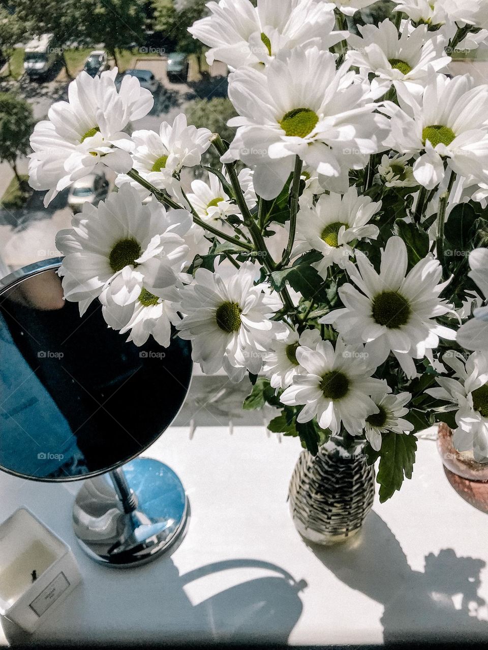 White beautiful flowers in vase at home