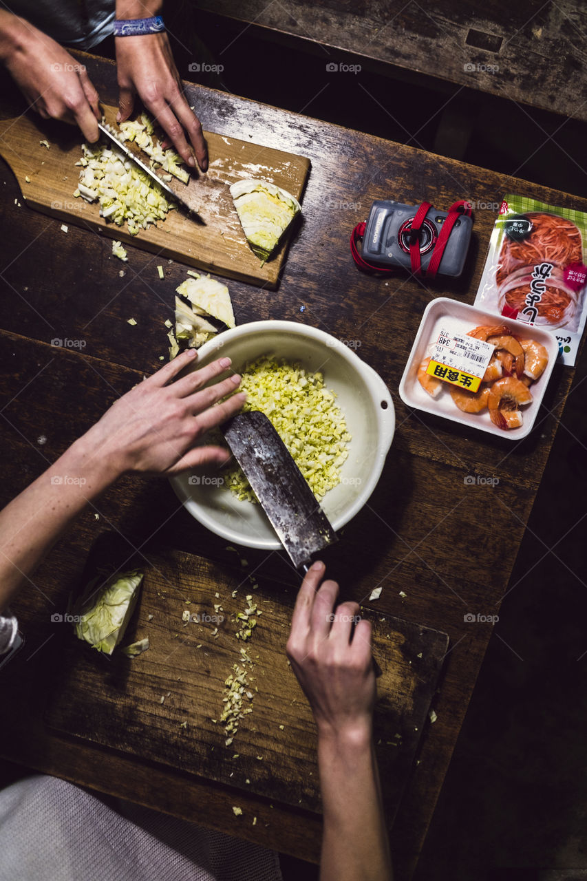 Cutting and cooking vegetables in a farmhouse on the Japanese countryside