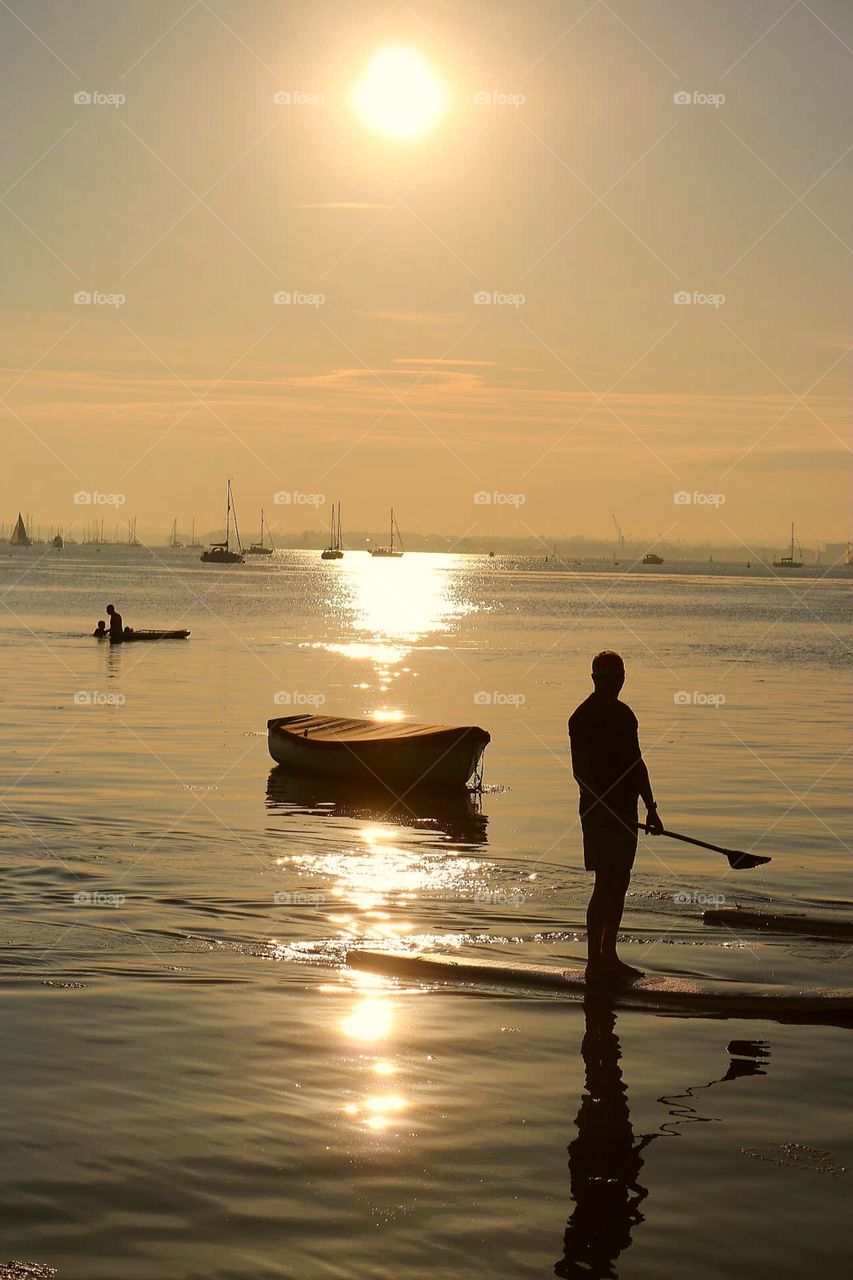 paddle board and boat