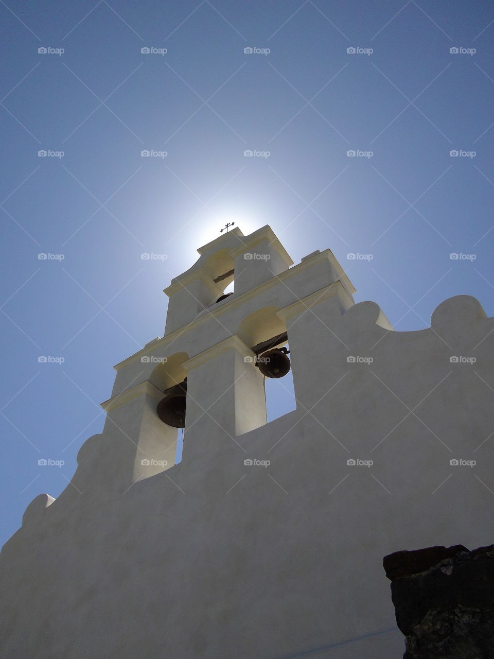 Sun behind the Mission Bells