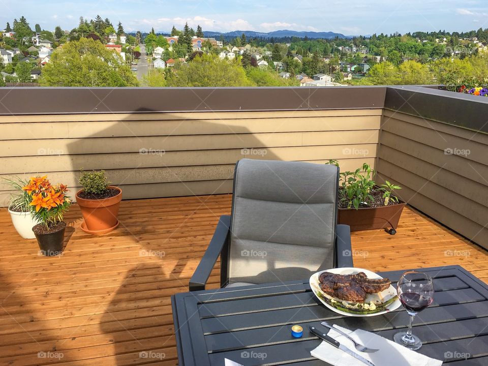 enjoying steak at the deck