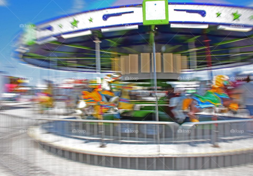 Slow shutter speed of a carousel at a county fair