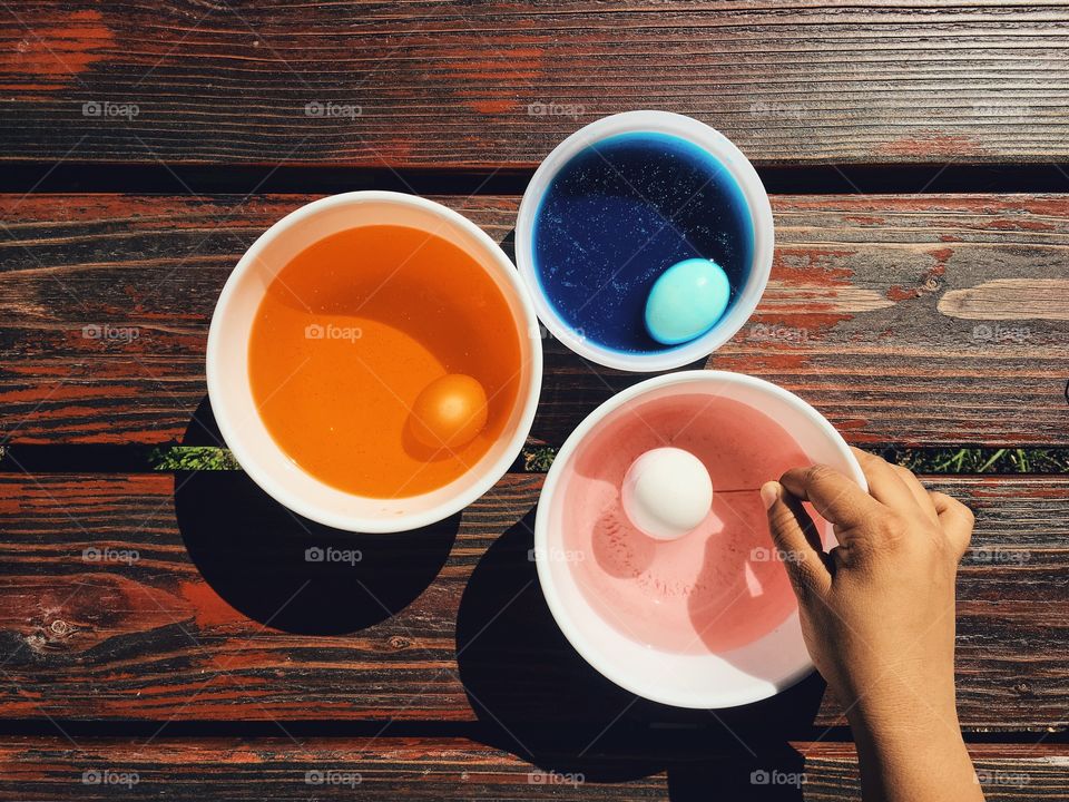 Multi colored egg in bowls