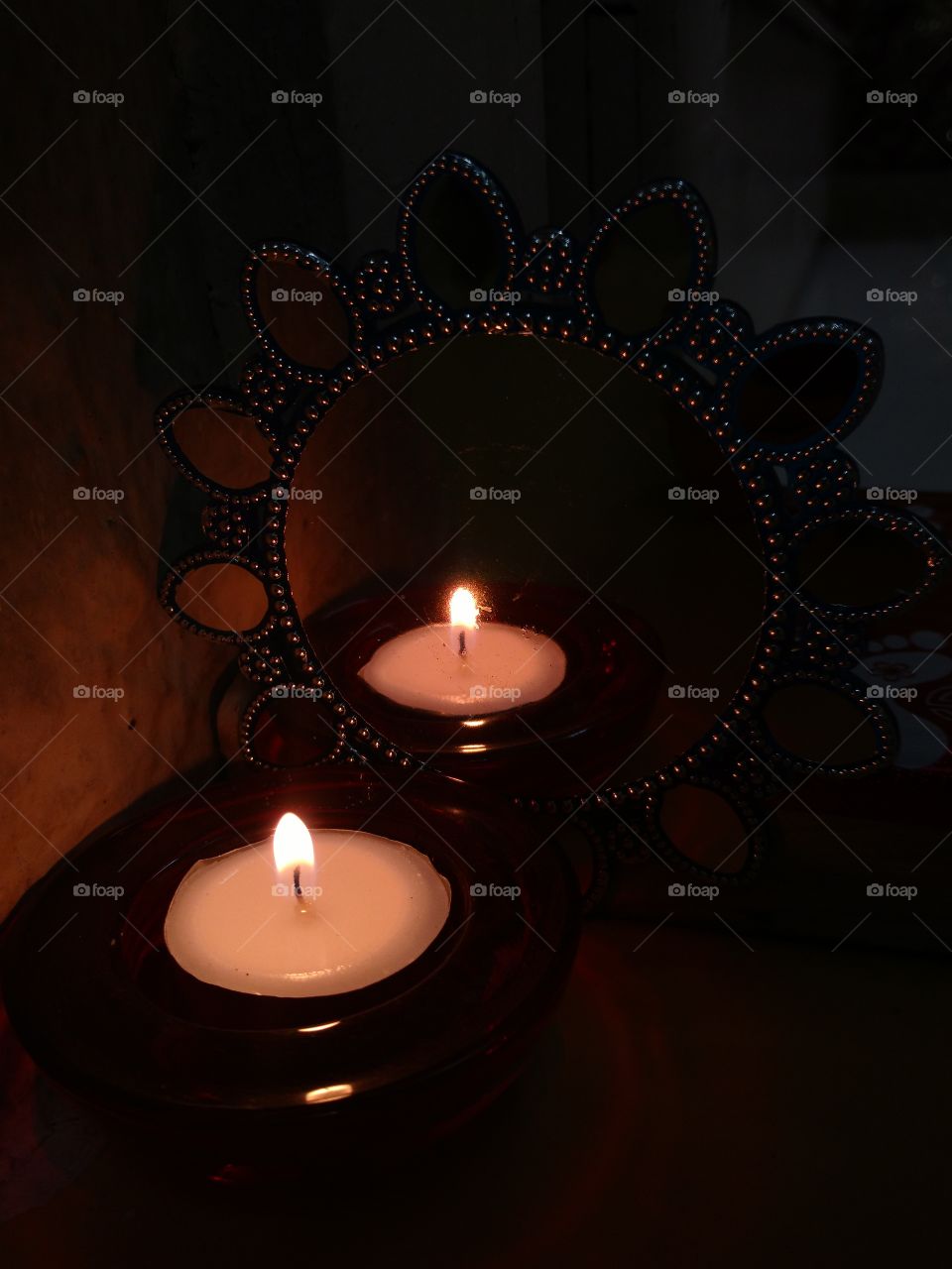 candle in mirror.