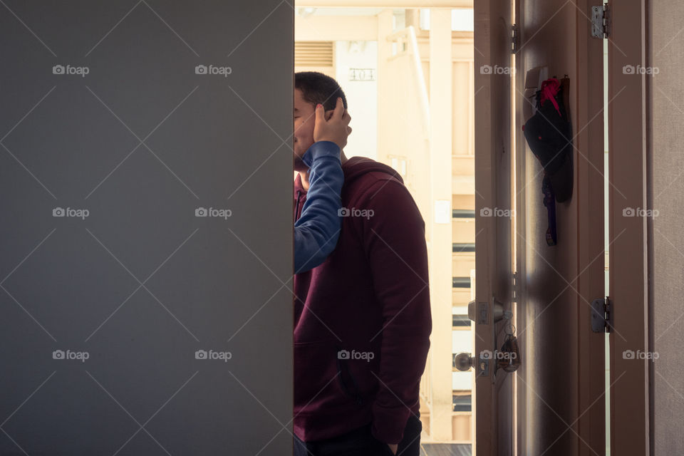 Young couple kissing each other in secret 