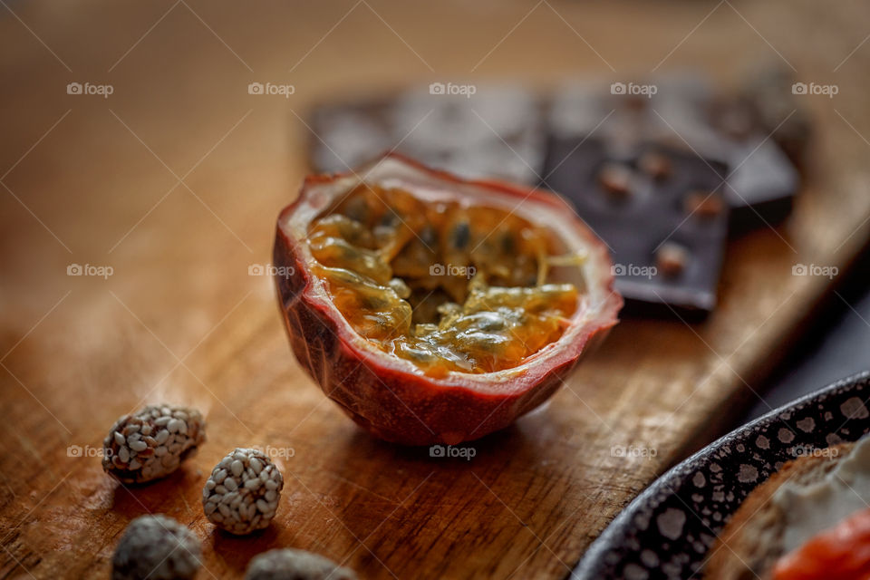 Passion fruit close up on wooden background