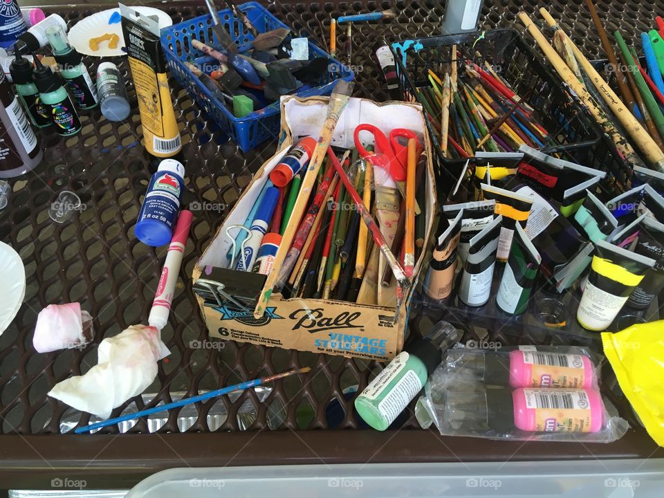 Art in the park paints and brushes this only happens in the summer at the park! 