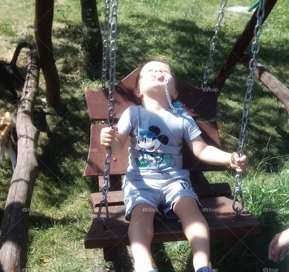 Child on a swing