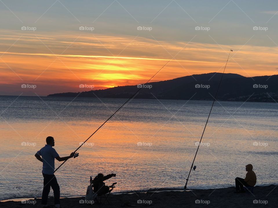 Fishing in sunset