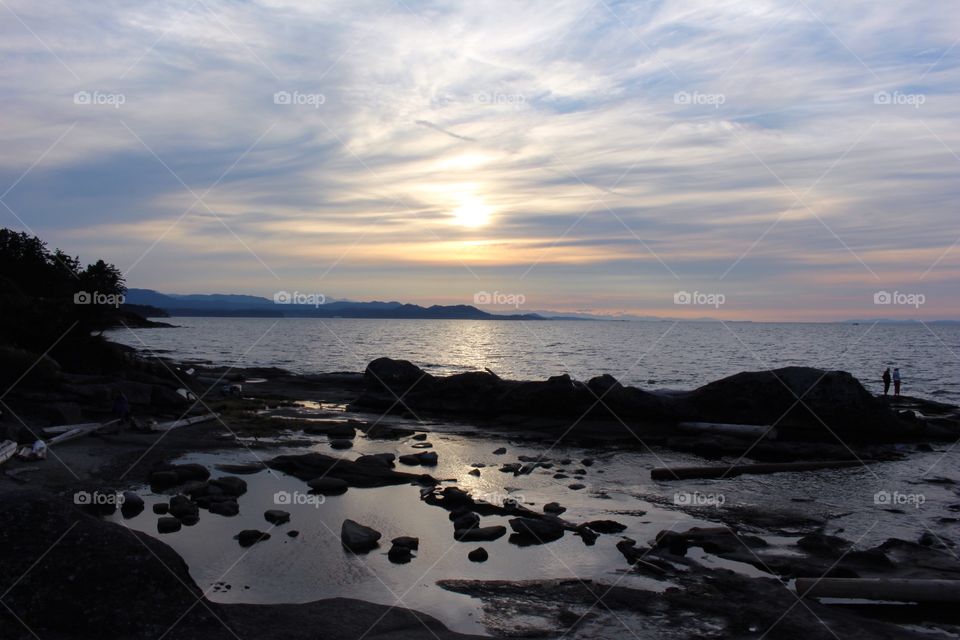 Couple looking out at the ocean in Gabriola Island