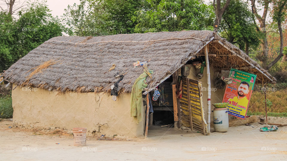 Small house made of mud and bamboos in rural area