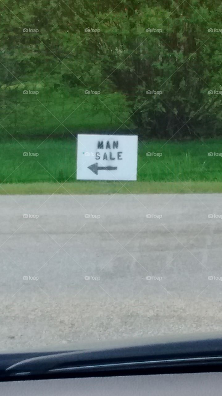 Man Sale Sign