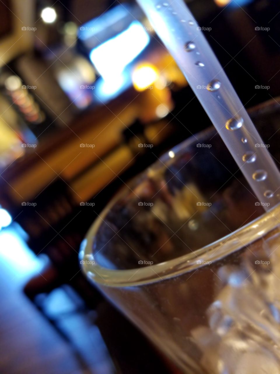 Water Dots Calmly Waiting in Line in My Drinking Straw