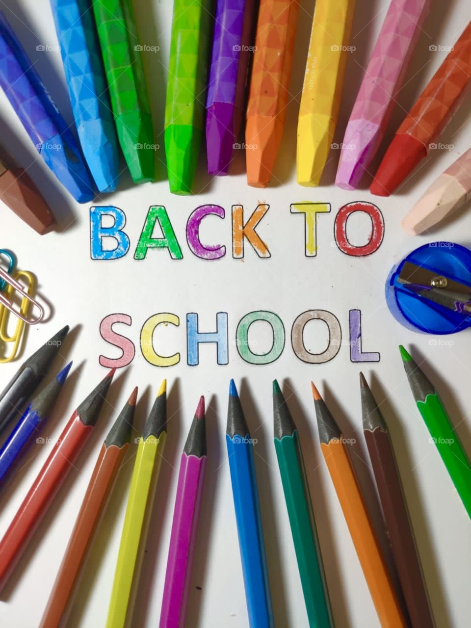 Ready to back to school! Lots of colored pencils, lots of crayons, paper clips, sharpener and lots of color.