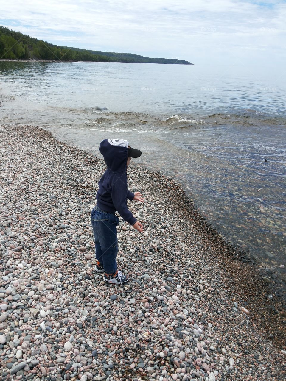 Throwing rocks in the water