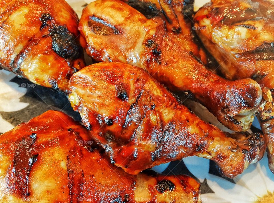Barbecued Chicken. Chicken Legs Cooked On The Grill
