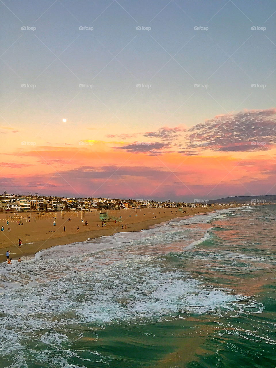 Scenic view of beach at sunset