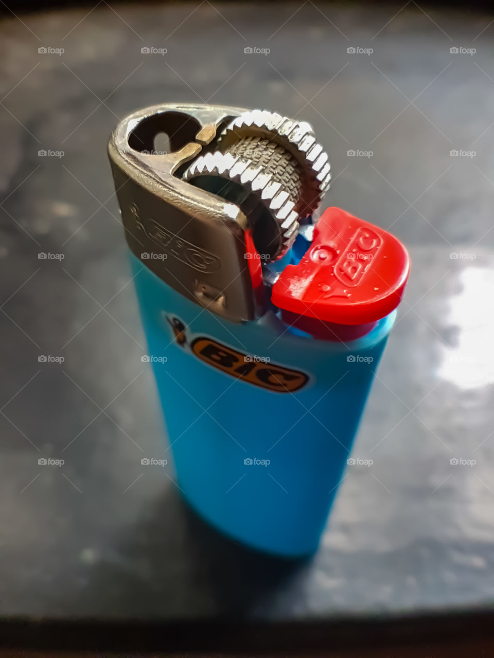 Small size bic lighter from a top angle