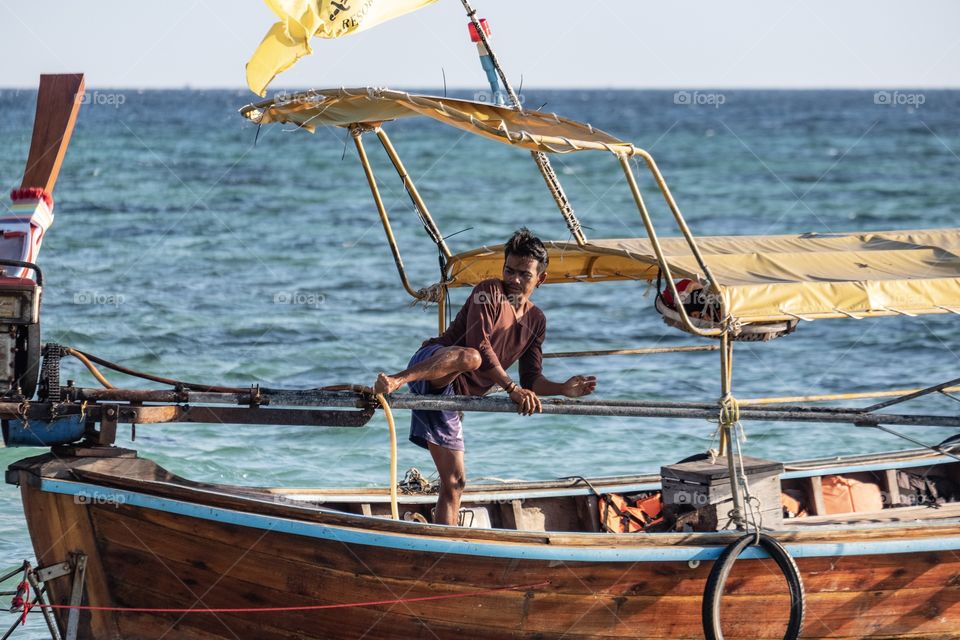 Boat driver prepare to start his job