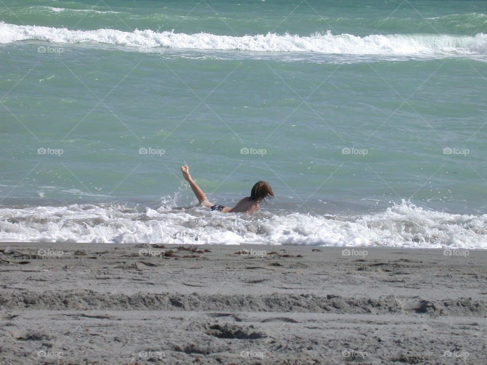 Playing in the ocean