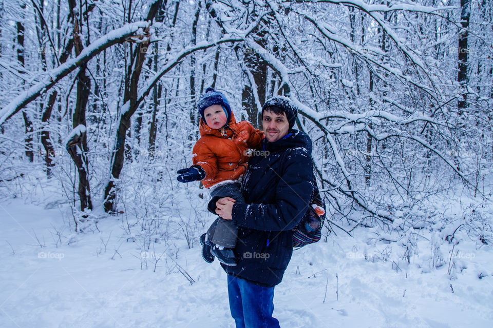 Father and son in winter