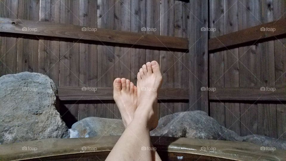 Soaking in the hot spring bath