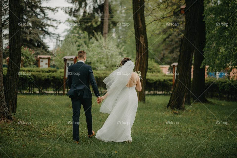 Romantic photo session of the bride and groom