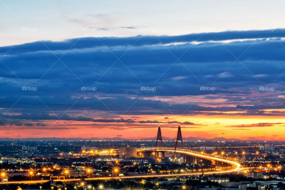 Beautiful light on the Bhumibol landmark Bridge in front of twilight in Bangkok Thailand