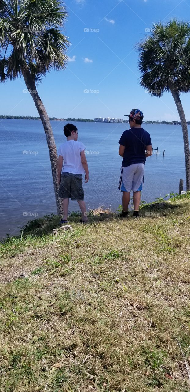 skipping rocks and playing by the water