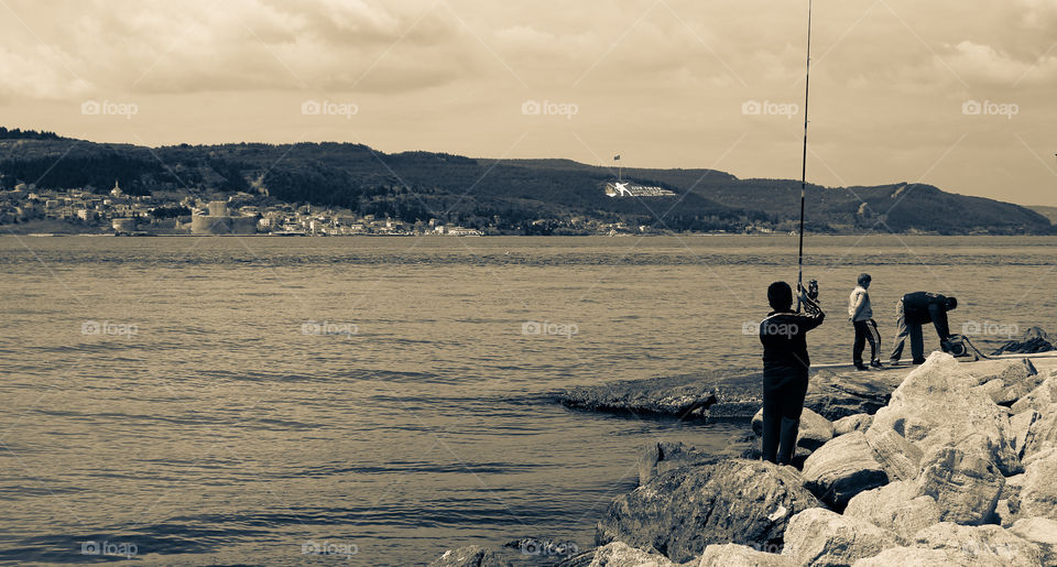 Fishing from the sea. 