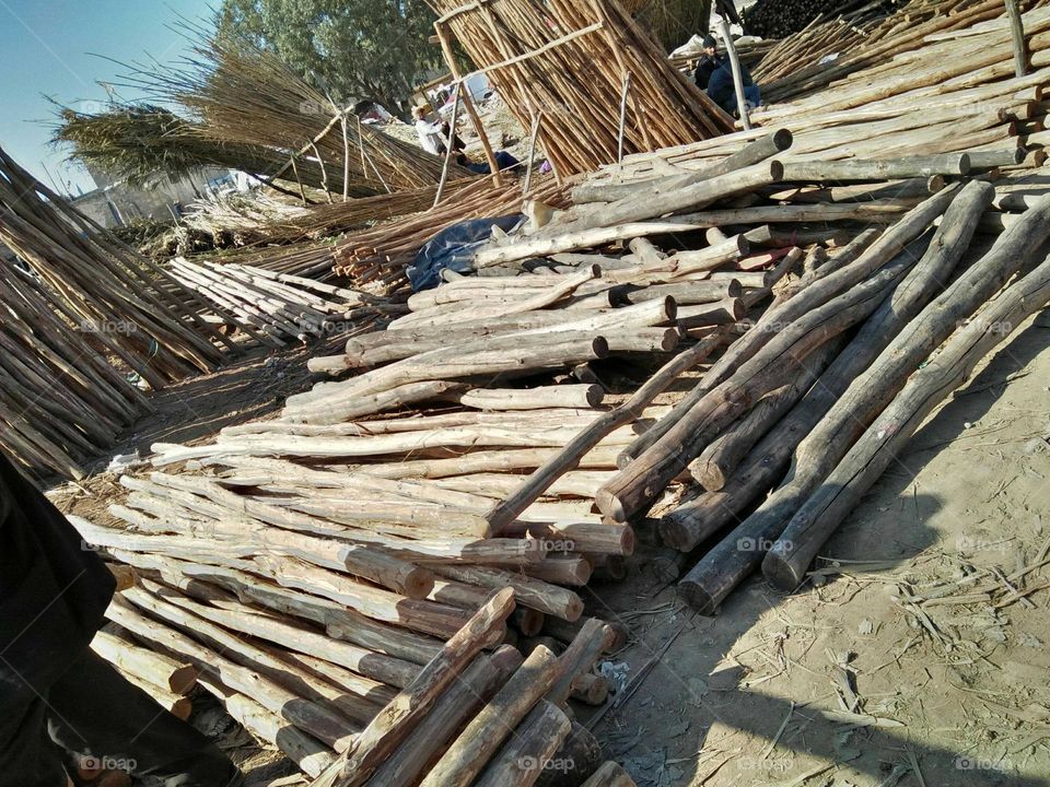 Various wood in a market.