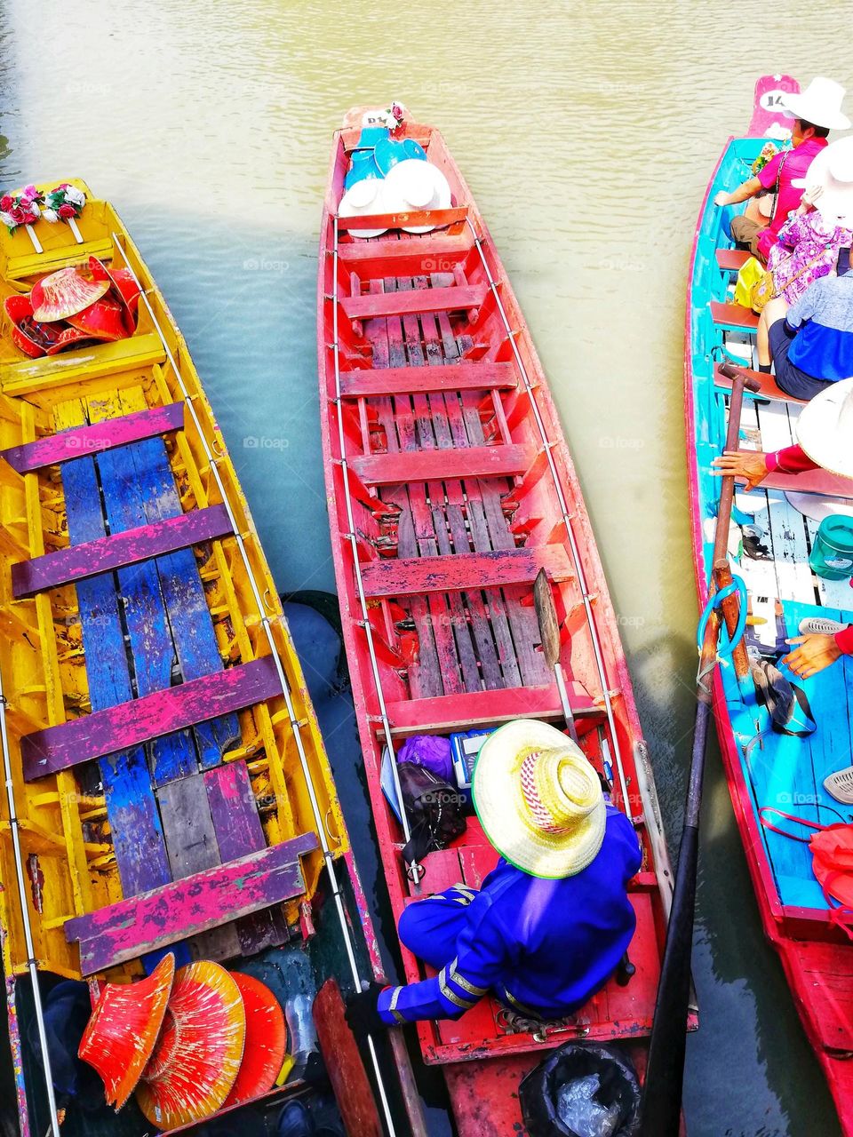 typical Thai colorful boats photographed from above