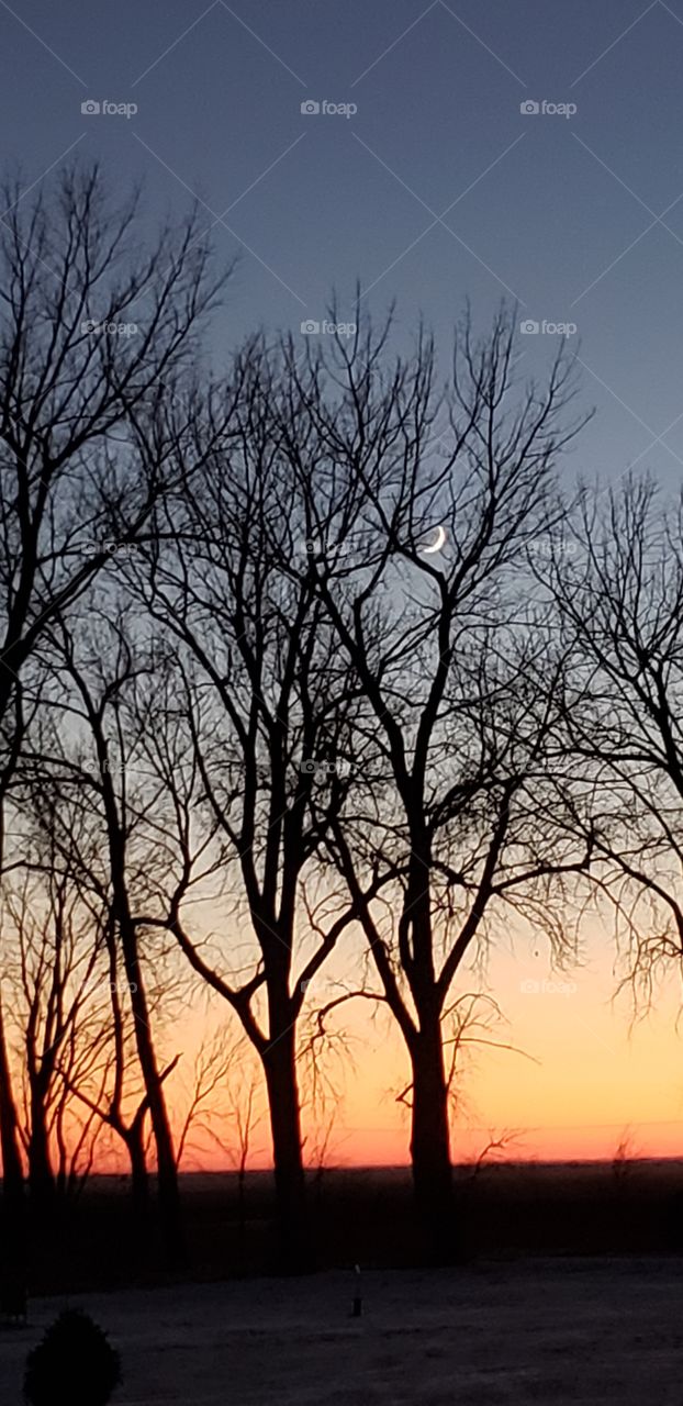 SUNSET WITH THE MOON