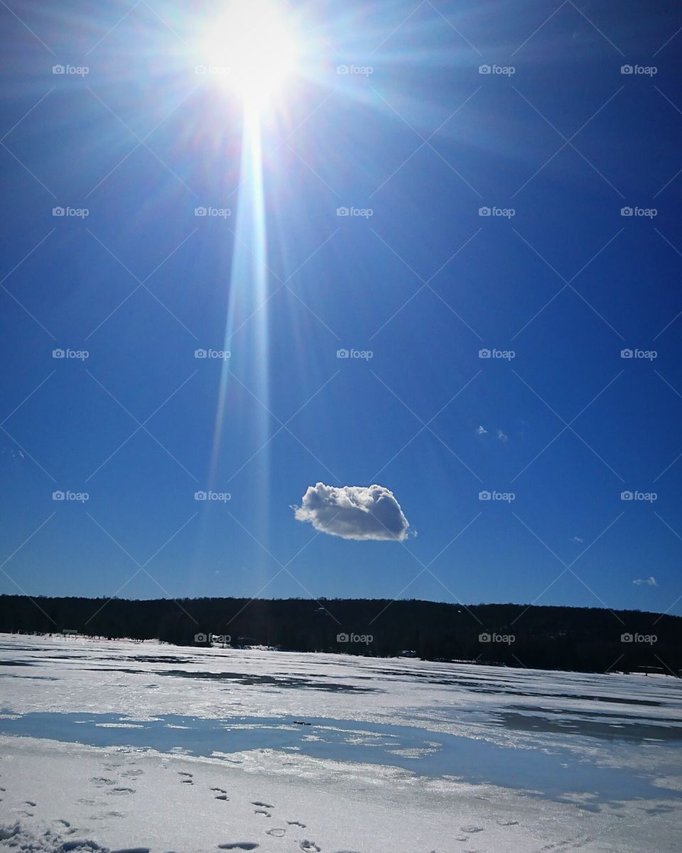 Sun rays on a Lonley cloud