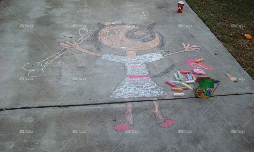 chalk art. my niece drew this as a human form portrait of her dog